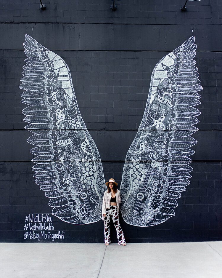Postcards from Hawaii Travel & Lifestyle blog 6 of the best murals in Nashville Tennessee, Murals in Nashville, angel wings Nashville, best murals in Nashville, I believe in Nashville